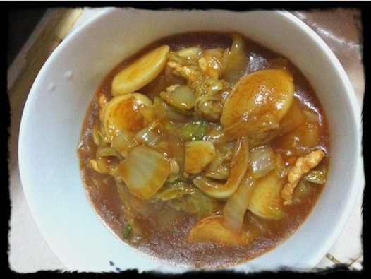 黄芽菜肉丝炒年糕的做法