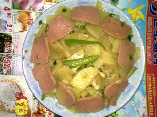 土豆片炒火腿的做法