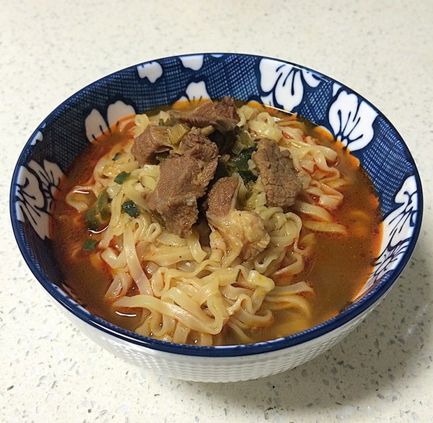 ţ