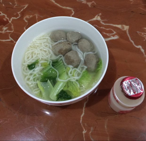 ţ