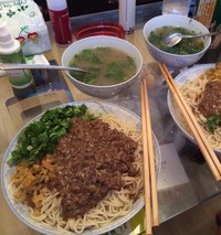 ţ2