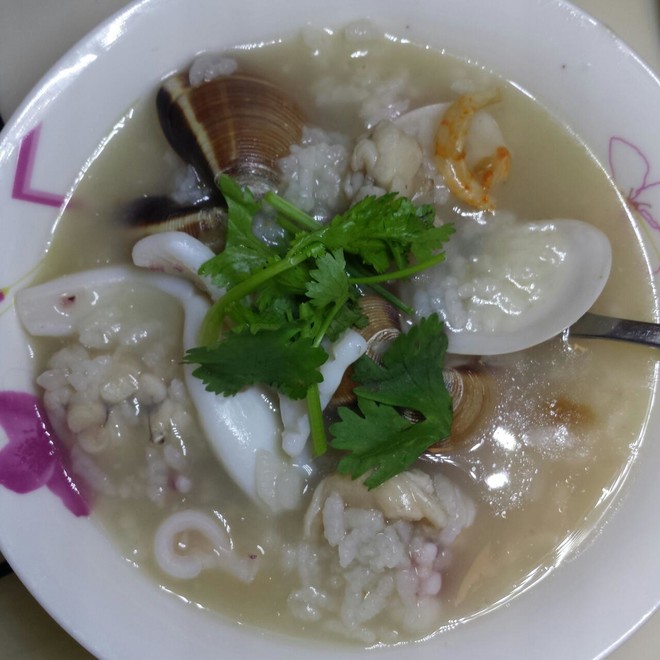 田鸡鮮鱿白贝沙锅粥的做法