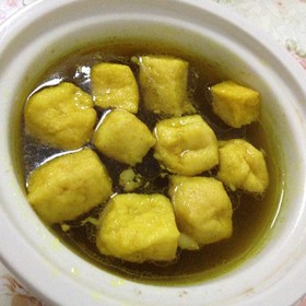 ţ