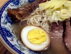 ţ